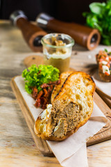 Beautiful fresh sandwiches with meat pate, cherry tomato and lettuce