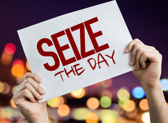 Seize the Day placard with night lights on background