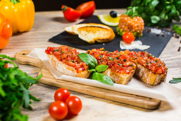Beautiful fresh sandwiches with feta cheese, tomatoes and Basil