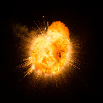 Realistic fiery explosion over a black background