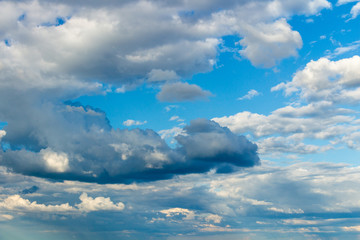 Blue sky with stormy clouds in the summer day