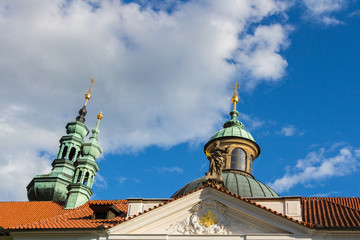 Fototapeta na wymiar Old Prague, close-up on towers of The Strahov Monastery, Czech Republic