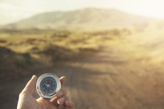man hand  compass