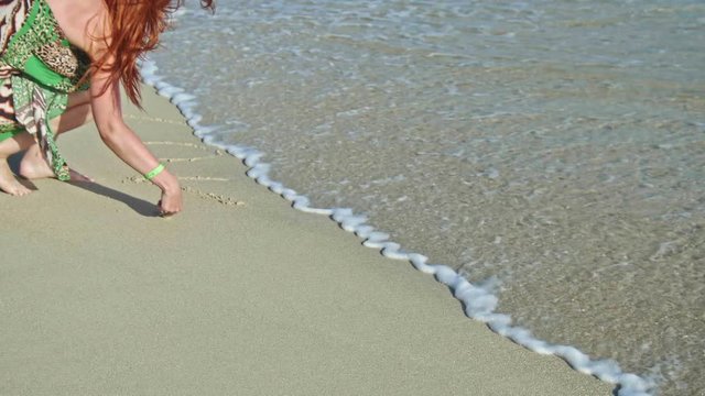 Young Woman Write Love On Sea Sand. Faster Rinse With Sea Water, Caribbean Sea,