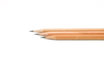 Wooden brown Pencils on white background