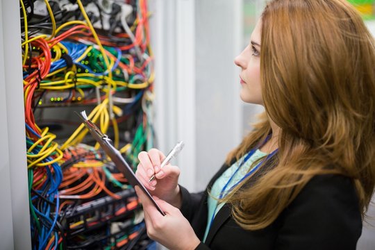 Technician preparing check list - Powered by Adobe