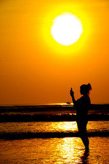 Fototapeta premium Silhouette of a photographer