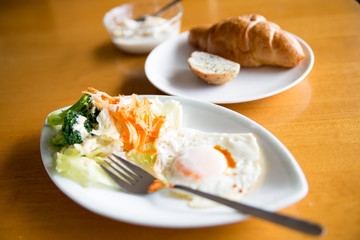 Croissant and yoghurt and egg & salad
