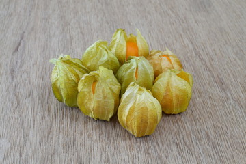 Cape gooseberry on wooden background