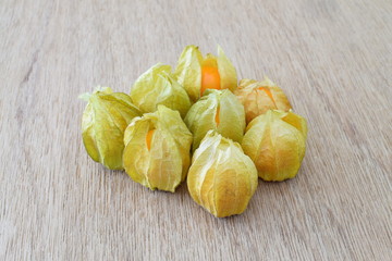 Cape gooseberry on wooden background