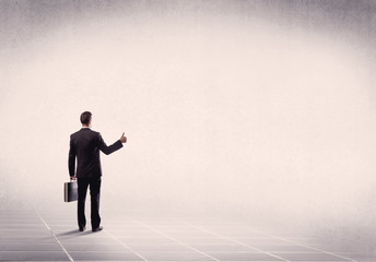 Fototapeta premium Business person standing in empty space