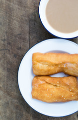 Cooffee in bowl with fried Bread Thai country style traditional
