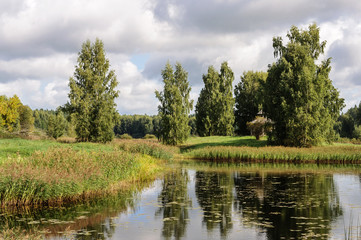 Rural landscape with small lake in Pushkinskiye Gory