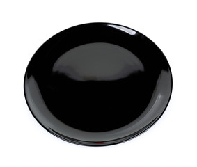 Black plate isolated on the white background