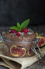 Chocolate Chia seed pudding layered and topped with fresh fruit