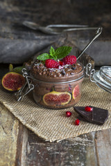 Chocolate Chia seed pudding layered and topped with fresh fruit