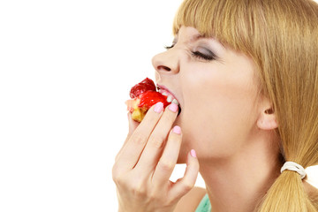 Woman eating cupcake sweet food