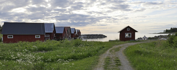 Fisherman cabins on the Swedish east coast  in sunset