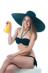 woman in bikini ready to go to the beach or whamming pool in white background 