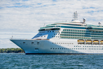 Fototapeta na wymiar Bow of Luxury Cruise Ship on Blue Water