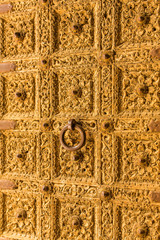 Golden door close up. Detail of Patwa Haveli in Jaisalmer, Rajasthan, India