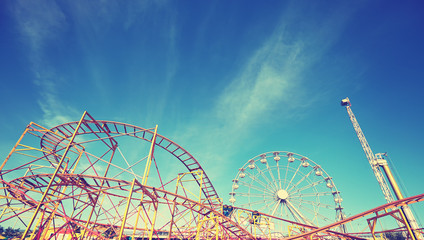 Fototapeta Vintage toned picture of an amusement park obraz