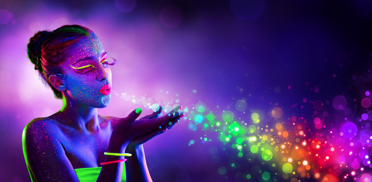 Fototapeta Neon Model Blowing Spectrum Lights - Disco Paint Makeup  