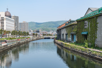 Fototapeta na wymiar Otaru canal in the morning, springtime, Otaru canal is a landmark of Otaru city, Hokkaido, Japan