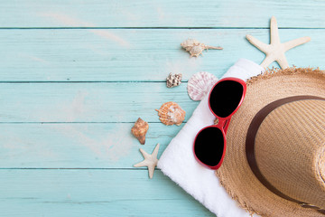 beach accessories on wooden board