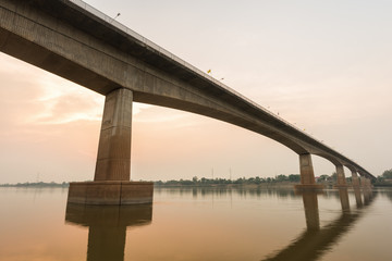 Bridge across the Mekong River at sunset. Thai-Lao friendship bridge at Nong Khai, Thailand