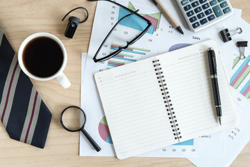 Cup of coffee on business desk office with copyspace