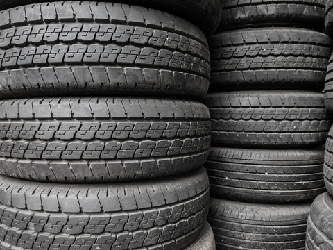 Close up stacks of old used tires. Texture