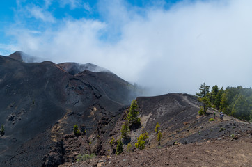 Hikers in volcanic landscape, La Palma, Canary islands, Spain