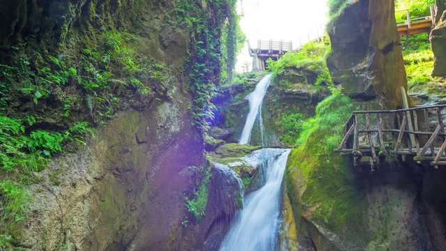 Grotto del Cagleron and waterfall in Italy, timelapse