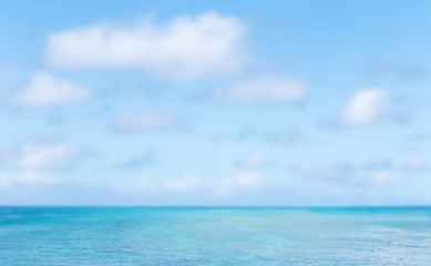 Blurred image of sea and blue sky background. blurred nature bac