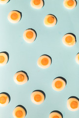 contemporary still life of a group fried eggs candy, colorful pop concept
