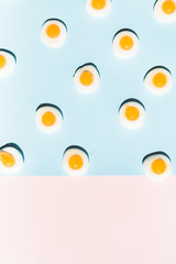contemporary still life of a group fried eggs candy, colorful pop concept