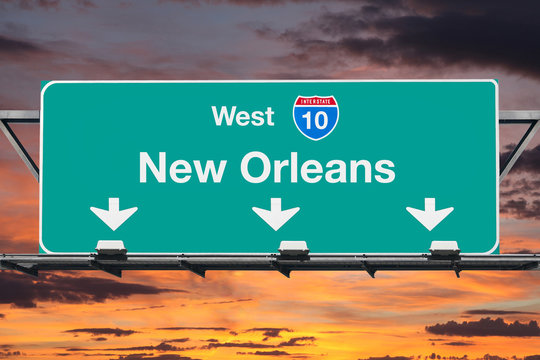 New Orleans Interstate 10 West Highway Sign With Sunrise Sky