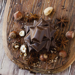 pieces of chocolate with nuts and cinnamon