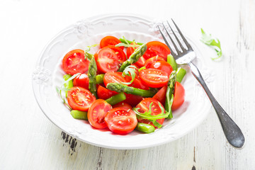 Fresh salad with cherry tomatoes and asparagus