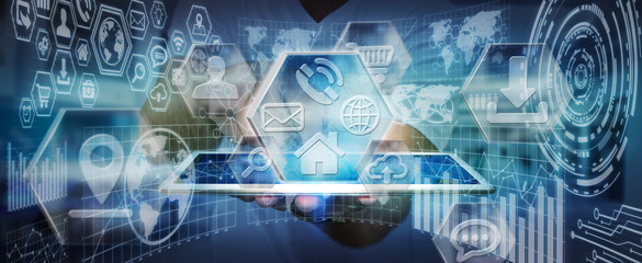 Young businessman using charts and icons interface