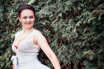 bride, girl in white dress in the park