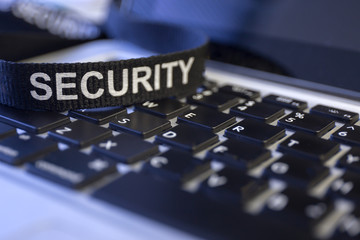 word security on labtop keyboard symbolized cyber crime protecti