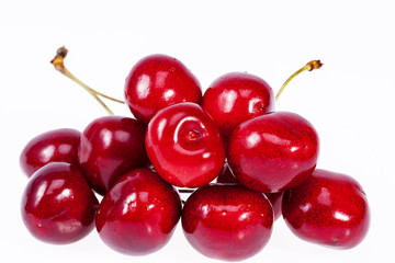 heap fruits of red cherry isolated on white background