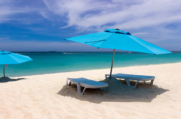 beach chairs and umbrella