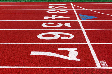 running track with marked lane numbers