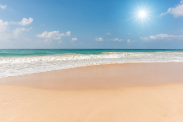 Fototapeta na wymiar Beautiful beach and tropical sea, Wave of the sea on the sand beach, Beach