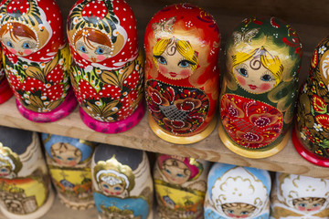 Fototapeta na wymiar Very large selection of matryoshkas Russian souvenirs at the gift shop in Moscow