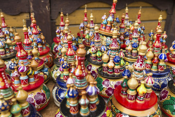 Fototapeta na wymiar Very large selection of matryoshkas Russian souvenirs at the gift shop in Moscow