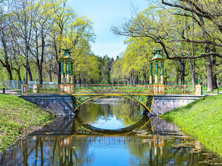 vivid green summer view to Chinese bridges in Pushkin, Russia.